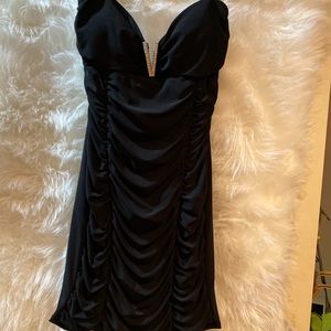 Women’s sexy black cocktail dress. MED